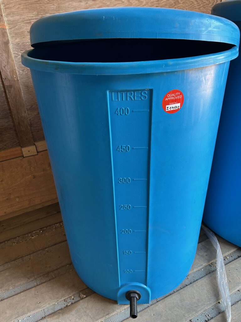 blue 400 litre plastic tub with tap and lid